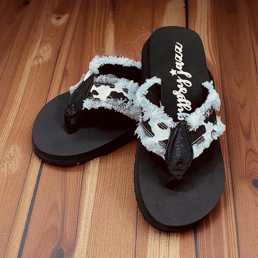 Gypsy Jazz Cow Print Black and White Flip Flops